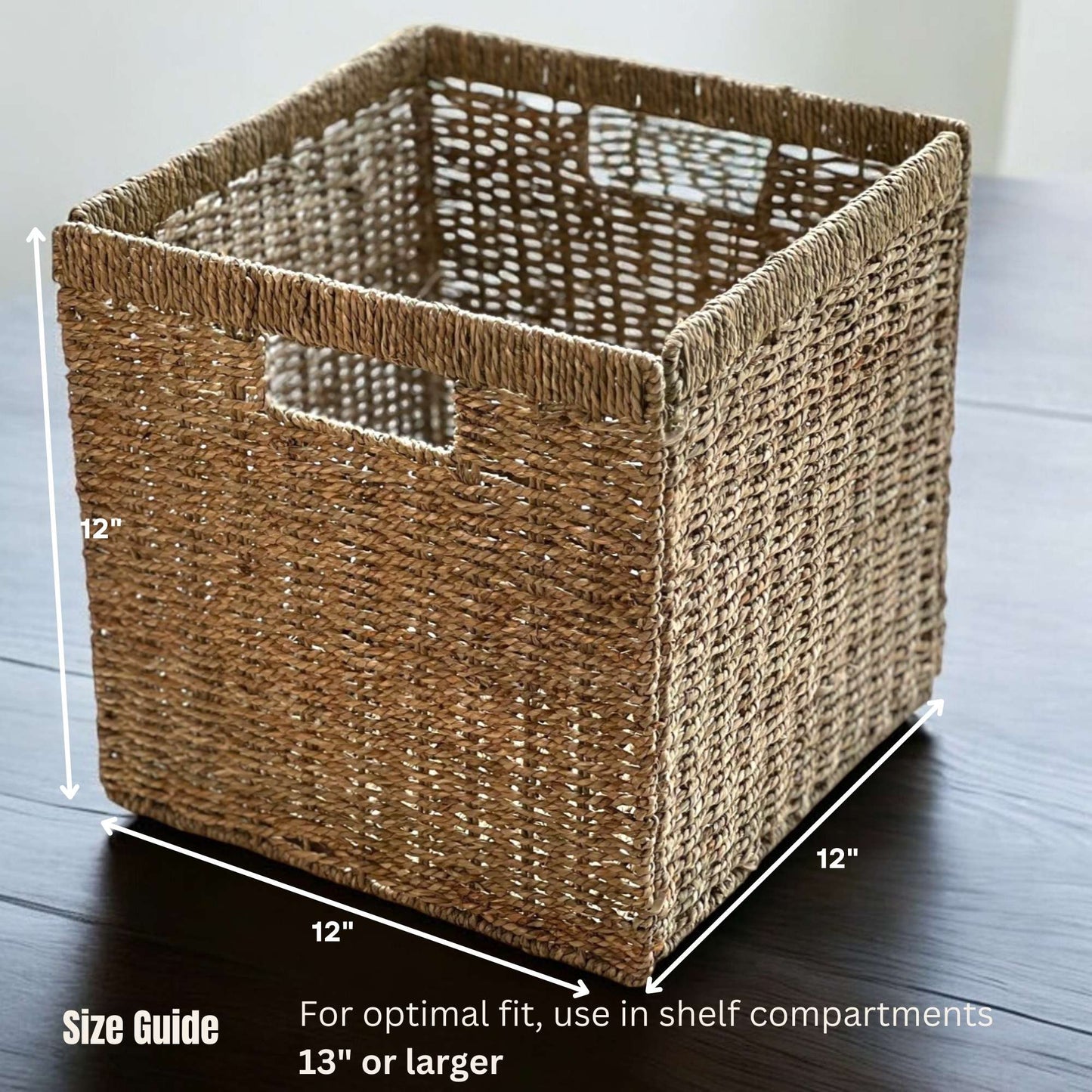 Square woven basket with handles, measuring 12 inches on all sides, designed to fit shelf compartments 13 inches or larger.