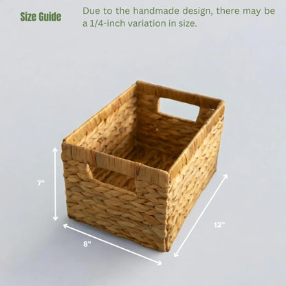Handmade rectangular wicker basket with dimensions of 12 inches by 8 inches by 7 inches, featuring side handles and a size guide noting a 1/4-inch variation.